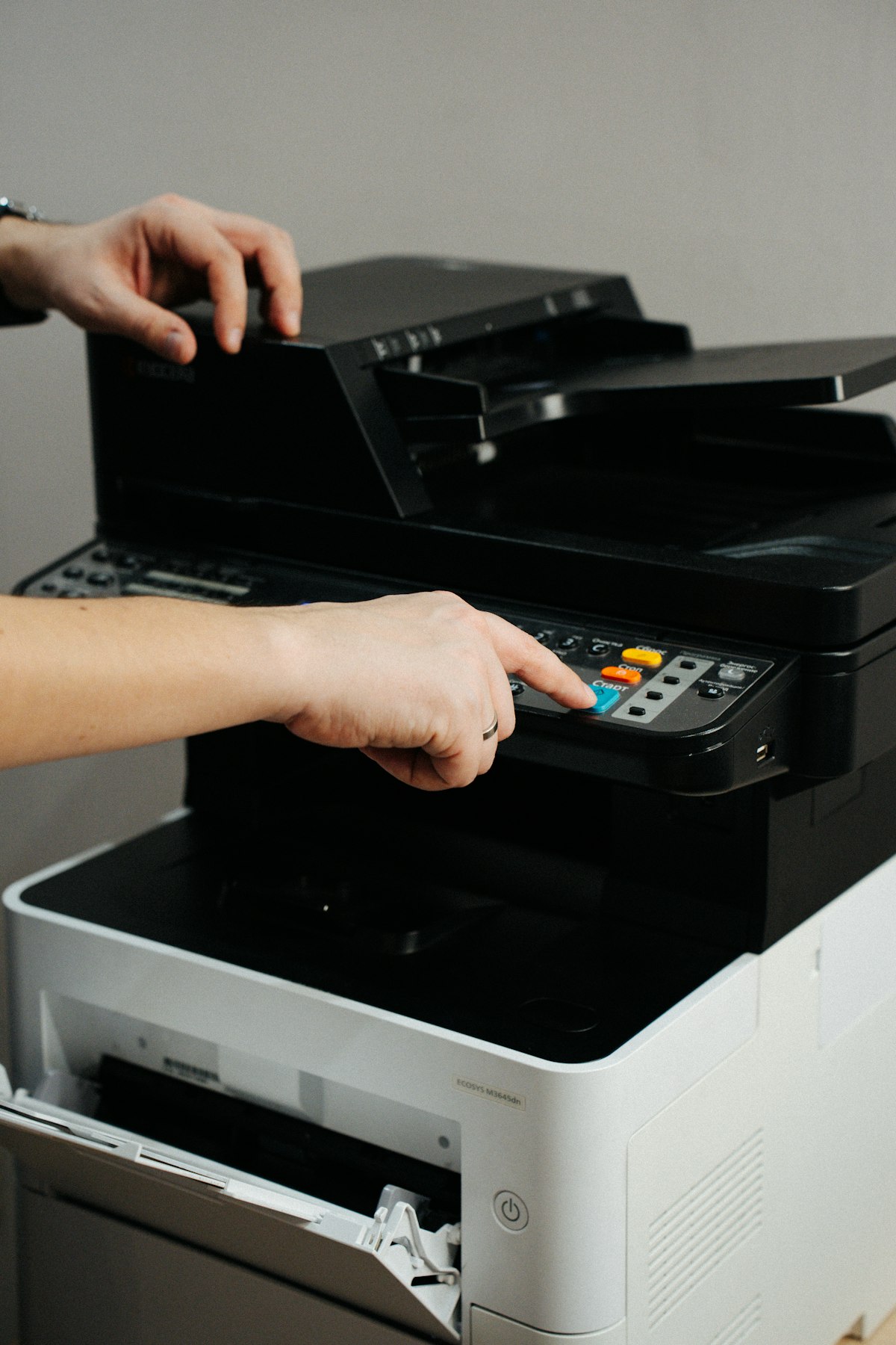 Person operating an office printer